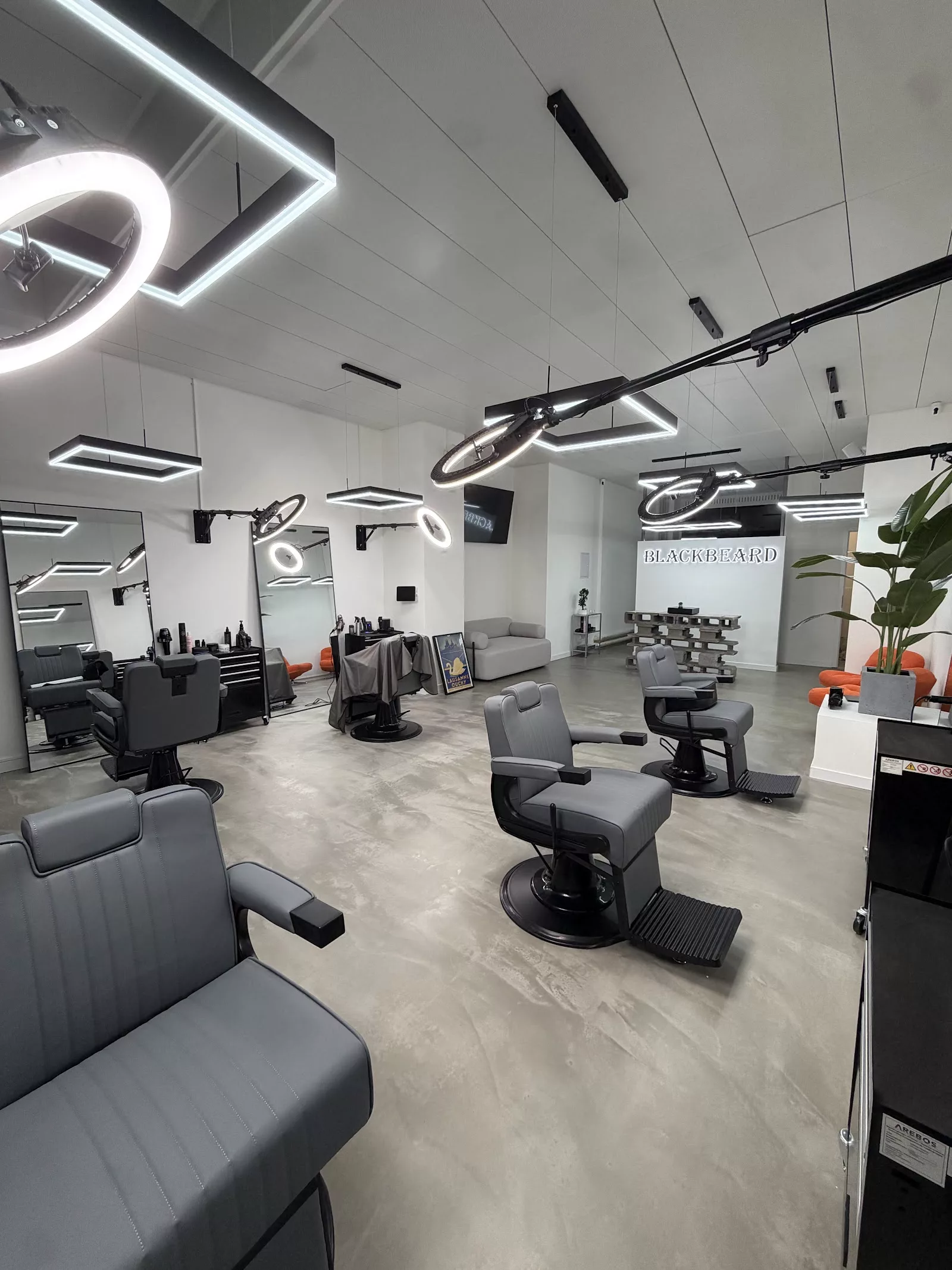 West Barber Lausanne Sàrl